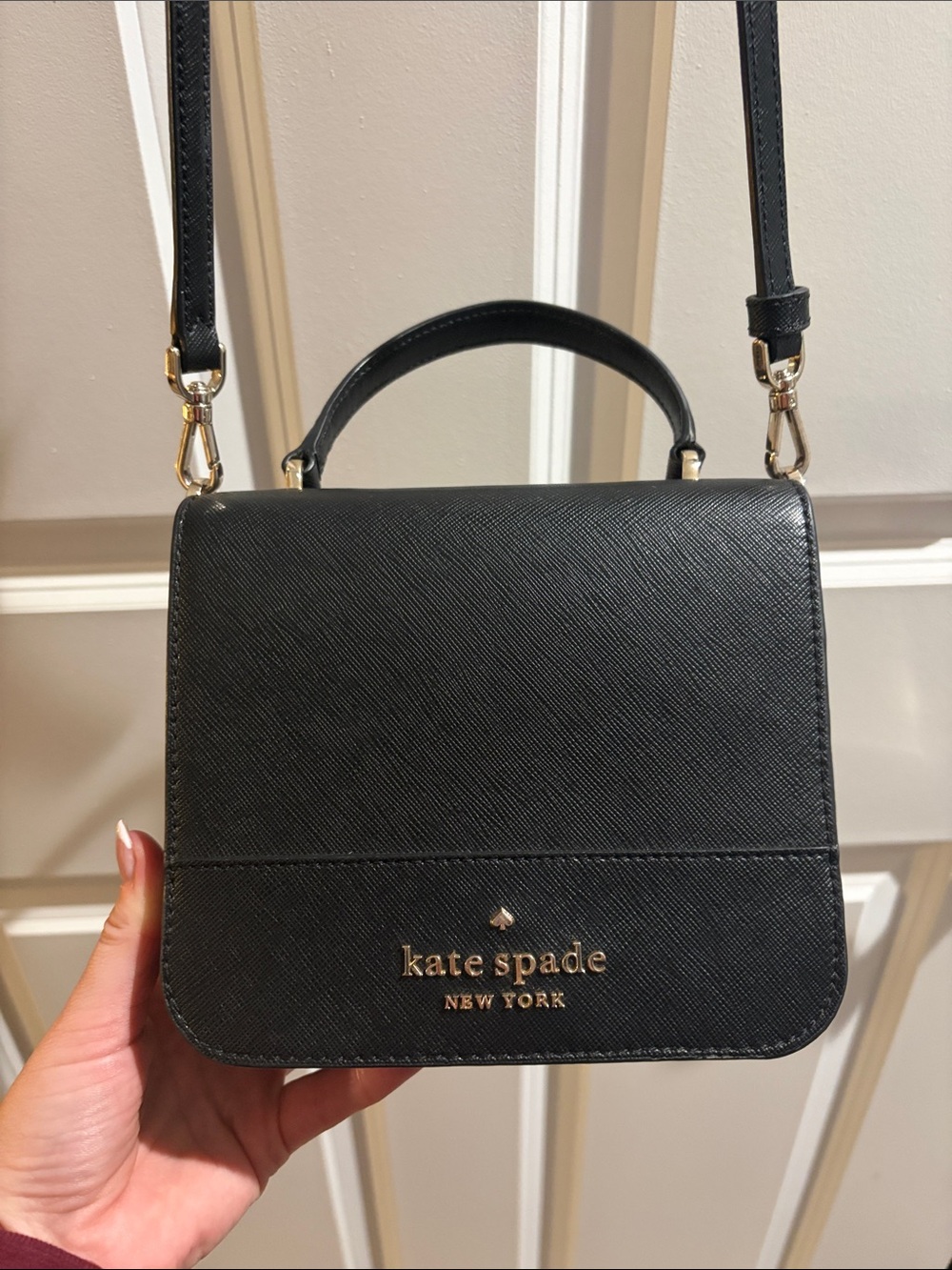 kate spade black saffiano leather top-handle crossbody bag with gold logo